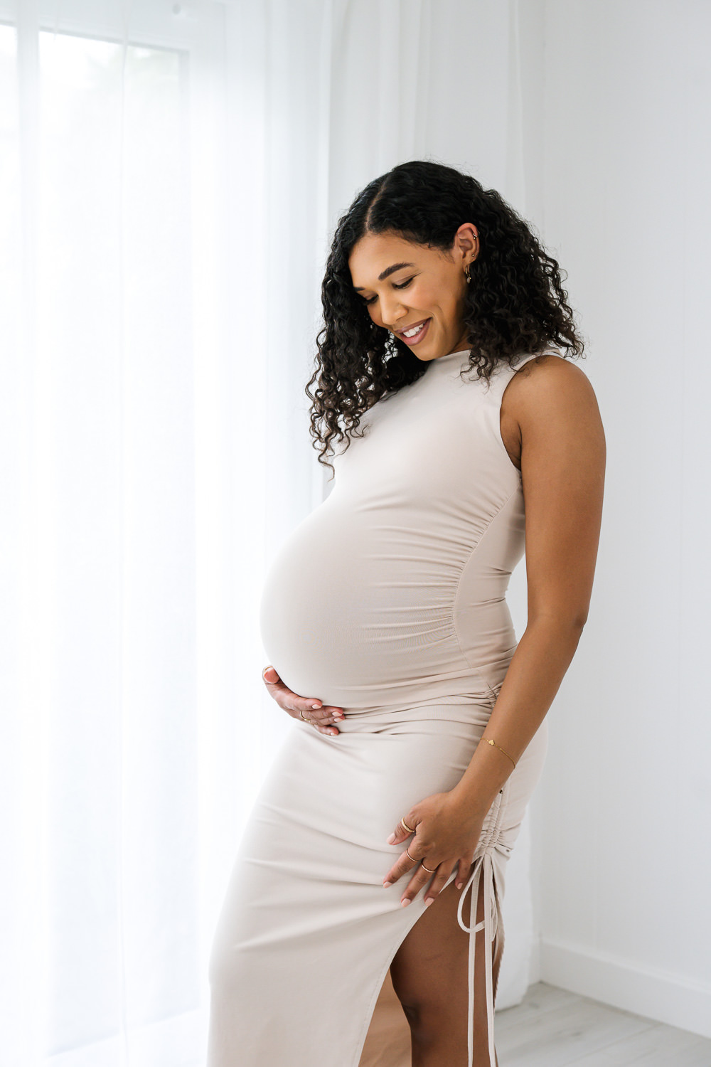 Beautiful pregnant belly photographed during a natural maternity photography session in Nottingham